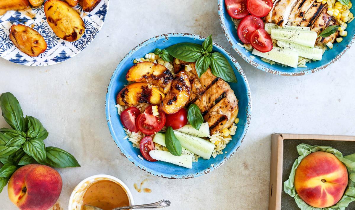 Article Cards Featured Image summer bowl with honey lime chicken and grilled peaches