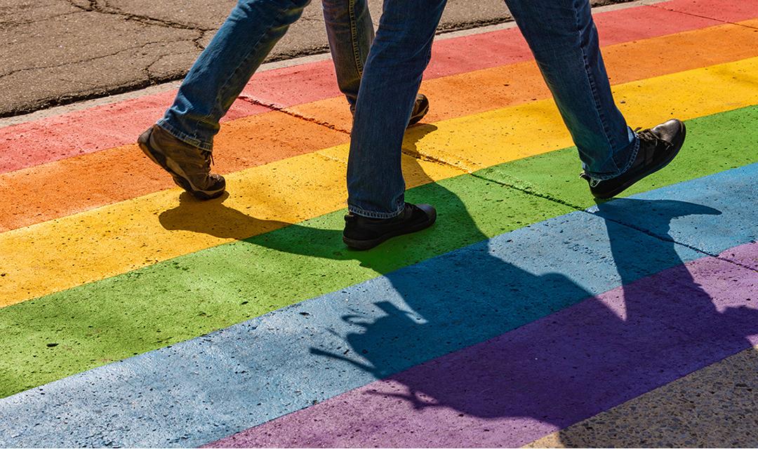 Article Cards Featured Image People walking on gay rainbow crosswalk in Montreal gay village