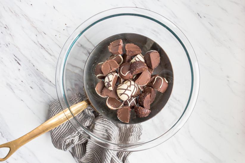 melting the truffles for the chocolate covered strawberries