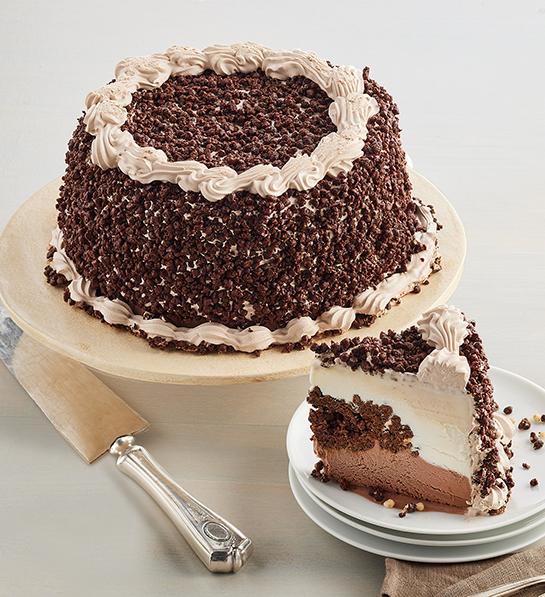 Birthday gift ideas with a Carvel cake on a stand.