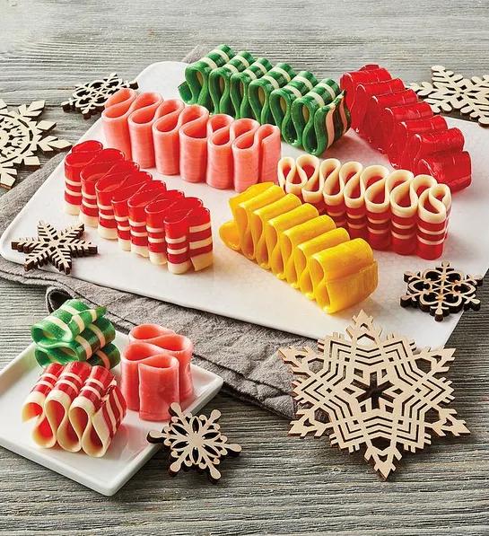 White elephant gift ideas with a plate of Christmas ribbon candy.