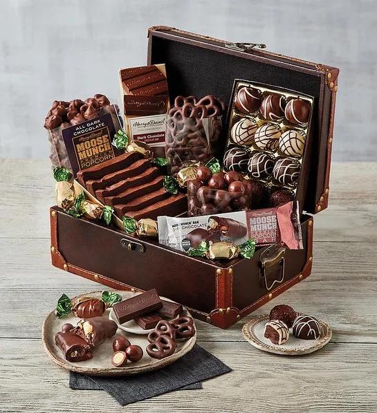 Galentine's Day gift ideas with a box of chocolate treats and truffles.