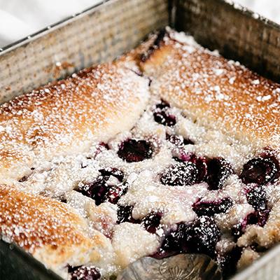 Types of pies with a closeup of a cherry almond cobbler.