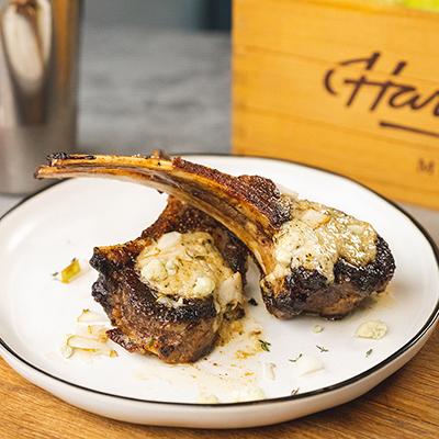 Lamb chops for New Year's dinner on a plate.