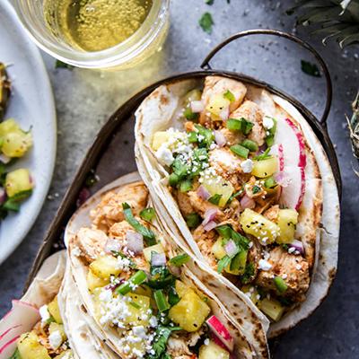 Strawberry recipes with a plate of chicken tacos.