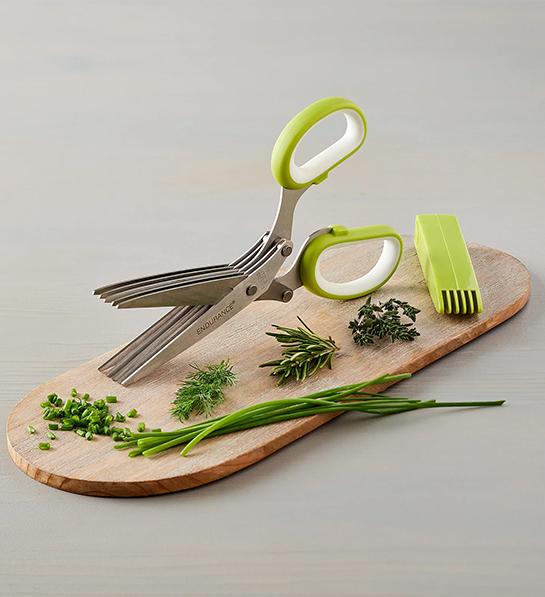 Gifts for the home cook with a pair of green handled herb scissors.